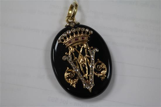A Victorian gold, rose cut diamond and ruby set black enamel oval pendant locket, 49mm.